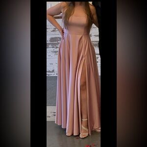 light pink formal dress. super comfy and only worn once. the back is unique
